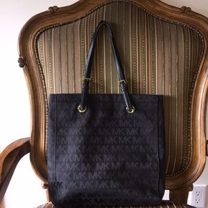 Michael Kors black tote with MK pattern
